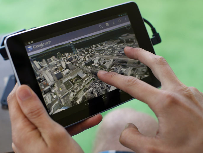 An attendee uses Google Map on a Google Nexus 7 tablet during Google I/O 2012 Conference at Moscone Center in San Francisco, California June 27, 2012. Google Inc unveiled its first tablet PC on Wednesday, as the Internet company looks to replicate its smartphone success in a tablet market where it faces stiff competition from Apple Inc, Microsoft and Amazon