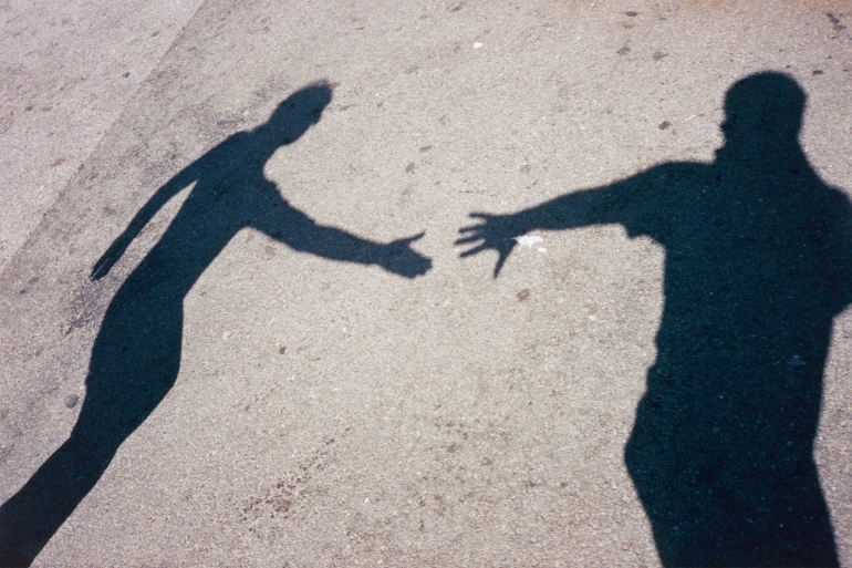 wo Shadows Reaching Out