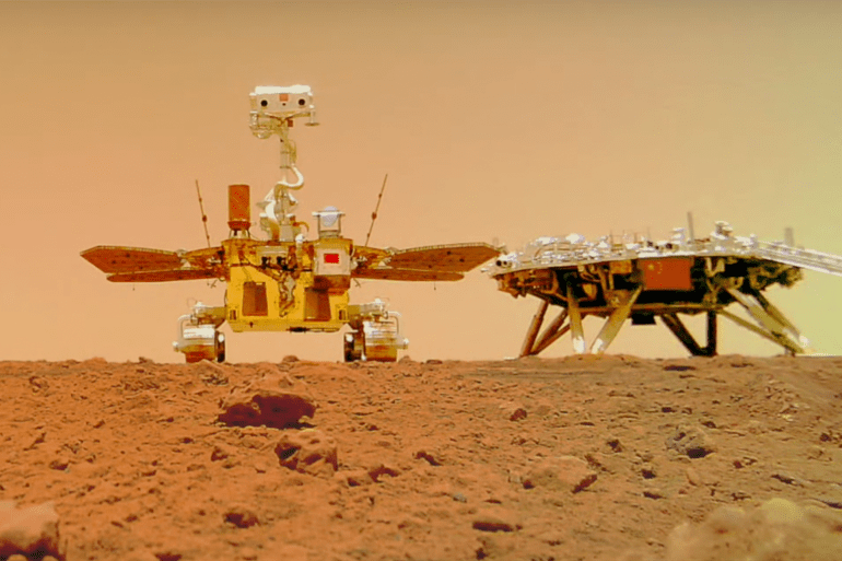 English: Zhurong rover group selfie with the Tianwen-1 lander, taken by the deployable Tianwen-1 Remote Camera. Date 30 August 2021 Source https://www.youtube.com/watch?v=BnrwZVJ_VAQ