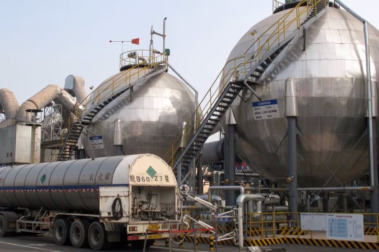 [1/2] CO2 storage tanks are seen at a cement plant and carbon capture facility in Wuhu, Anhui province, China September 11, 2019. REUTERS/David Stanway Purchase Licensing Rights