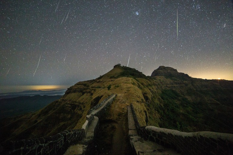 Geminids meteor shower over Rajgad Fort in Maharashtra, India.