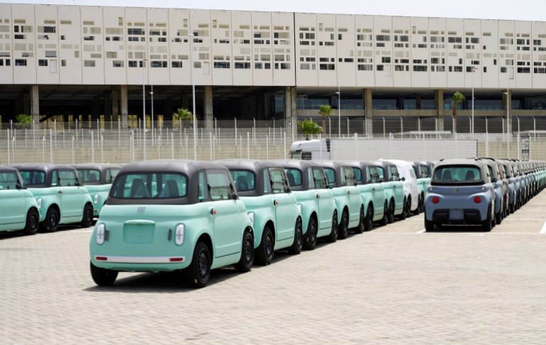 Fiat and Citroen electric vehicles wait to be exported at Tanger Med Port, on the Strait of Gibraltar, east of Tangier, Morocco June 6, 2024. REUTERS/Abdelhak Balhaki