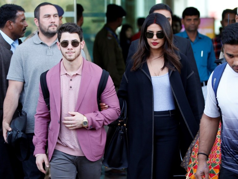 Actress Priyanka Chopra and her husband Nick Jonas arrive in Udaipur to attend pre-wedding celebrations of Isha Ambani, daughter of the Chairman of Reliance Industries Mukesh Ambani, in the desert state of Rajasthan, India, December 8, 2018. REUTERS/Amit Dave