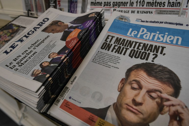 This photograph shows the French local press at a kiosk after the French legislative elections in Paris on July 8, 2024.