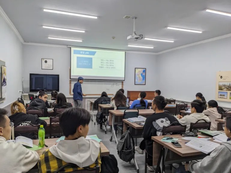 Teenage students learn Korean at the King Sejong Institute in Tashkent, a cultural centre funded by the South Korean government [Ruairi Casey/Al Jazeera]