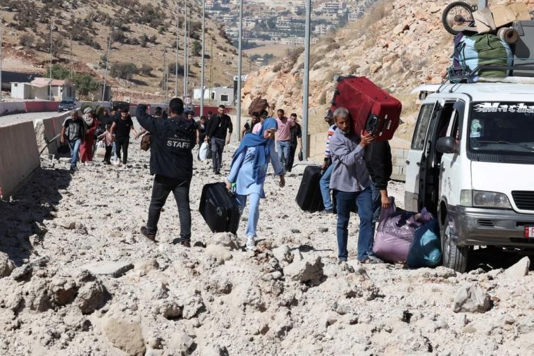 شام مصطفى_سوريا_لقطة للنازحين السوريين واللبنانيين بعد القصف الإسرائيلي لمحيط المصنع (١)_مواقع التواصل https_www.facebook.com_share_p_c9nEbMCw4PFM2rv9_ _