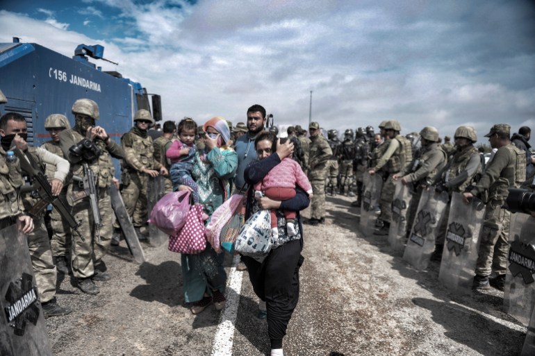 Syrian refugees walking on Turkey-Syria border in Suruc district. 18 FEBRUARY 2015 SANLIURFA at TURKEY,