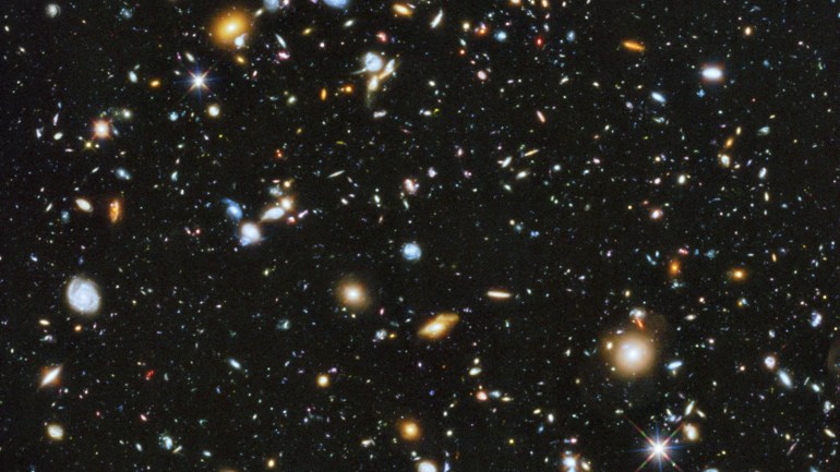 A composite of separate exposures taken in 2003 to 2012 with Hubble's Advanced Camera for Surveys and Wide Field Camera 3 of the evolving universe is shown in this handout photo provided by NASA, June 3, 2014. Researchers say the image, from a new study called the Ultraviolet Coverage of the Hubble Ultra Deep Field, provides the missing link in star formation. Made from 841 orbits of telescope viewing time, it contains approximately 10, 000 galaxies, extending back in time to within a few hundred million years of the big bang, according to NASA. REUTERS/HUDF/NASA/Handout via Reuters (OUTERSPACE - Tags: SCIENCE TECHNOLOGY) ATTENTION EDITORS - FOR EDITORIAL USE ONLY. NOT FOR SALE FOR MARKETING OR ADVERTISING CAMPAIGNS. THIS IMAGE HAS BEEN SUPPLIED BY A THIRD PARTY. IT IS DISTRIBUTED, EXACTLY AS RECEIVED BY REUTERS, AS A SERVICE TO CLIENTS