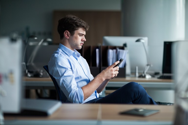 Businessman working on phone