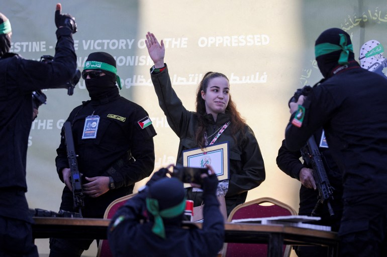 Palestinian Hamas militants release female Israeli soldier Agam Berger held in Gaza since the deadly October 7 2023 attack, as part of a ceasefire and a hostages-prisoners swap deal between Hamas and Israel, in Jabalia, in the northern Gaza Strip, January 30, 2025. REUTERS/Dawoud Abu Alkas TPX IMAGES OF THE DAY