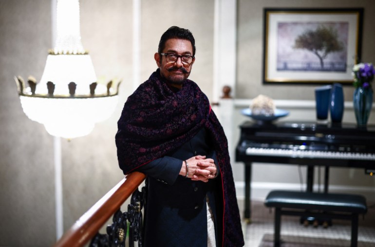 Indian actor Aamir Khan poses for a portrait inside a hotel during an interview with AFP in London on December 3, 2024. - During the Covid-19 pandemic, Bollywood superstar and filmmaker Aamir Khan considered quitting cinema for good after dominating the Indian film industry for more than four decades. Now, on the eve of turning 60 in March, Khan, who lives in Mumbai, wants to "continue to act and produce for some time". He also wants to use his company Aamir Khan Productions "as a platform to encourage new talent... whose sensibility is close to mine. And (who) want to tell stories which affect me." (Photo by HENRY NICHOLLS / AFP)