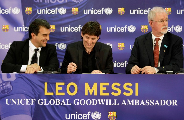 Barcelona's player Lionel Messi of Argentina signs an agreement to undertake the role of UNICEF Goodwill Ambassador for two years at Nou Camp stadium in Barcelona