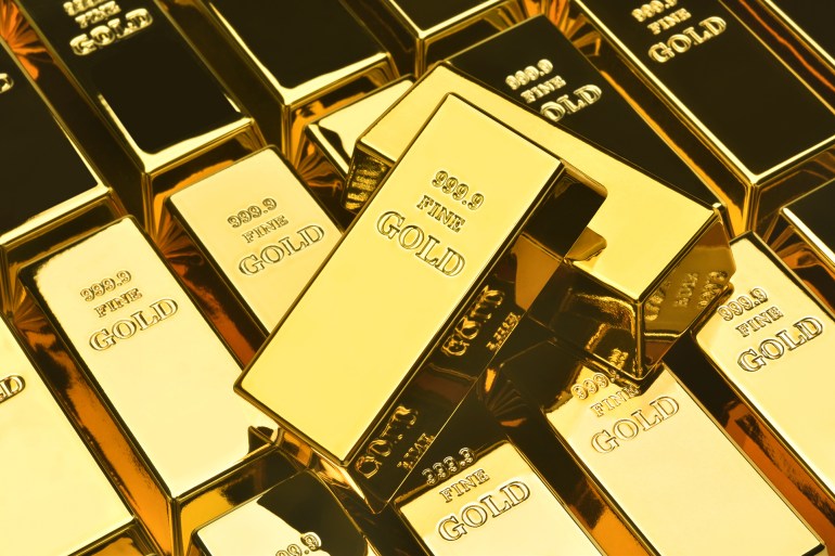 Stack of gold bars, Financial concepts; Shutterstock ID 1696407022; purchase_order: aj; job: ; client: ; other: