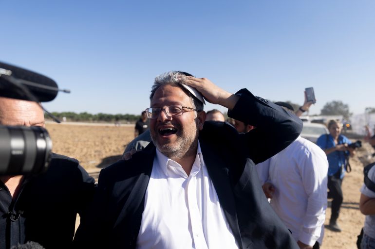 SOUTHERN BORDER, ISRAEL - OCTOBER 21: Israeli National Security Minister Itamar Ben Gvir attends a Sukkoth gathering calling for resettling Gaza with Jewish communities near the border with the Gaza Strip on October 21, 2024 in Southern Border, Israel. Far-right activists and members of the Israeli Parliament, the Knesset, are gathering at an event billed as "Preparing to Resettle Gaza," near Israel's border with Gaza, on Monday. Participants in the conference are calling for the rebuilding of Jewish Israeli settlements in the Gaza Strip. (Photo by Amir Levy/Getty Images)
